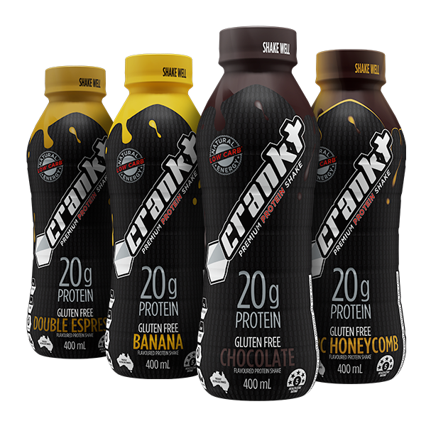 Assorted Crankt Protein Shakes 400mL bottles in flavours Chocolate Choc Honeycomb Banana and Double Espresso arranged together