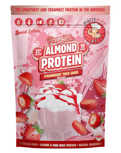 Package of almond protein powder with strawberry thick shake flavor, featuring a pink and red design with strawberries and a shake.