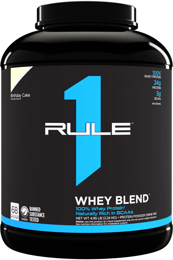 Black tub of Rule 1 Whey Blend Birthday Cake flavour protein powder showing 68 servings and nutrition highlights on label