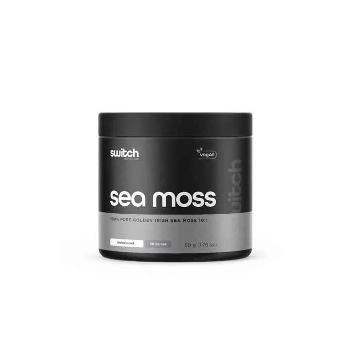 A container of Switch Nutrition Sea Moss, which is a black powder in a gray container with white and green labeling.