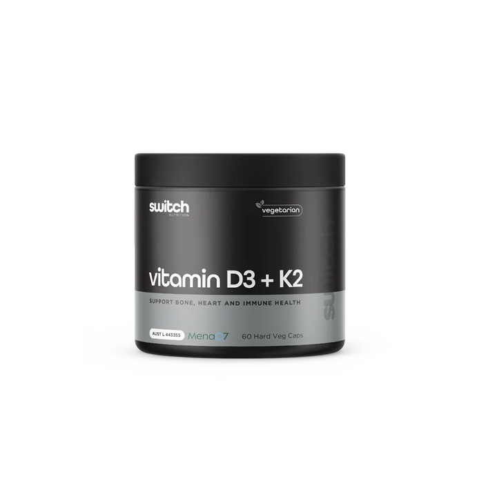 A container of Switch Nutrition Vitamin D3 + K2, with a black and grey label, indicating support for bones, immunity, and heart health.