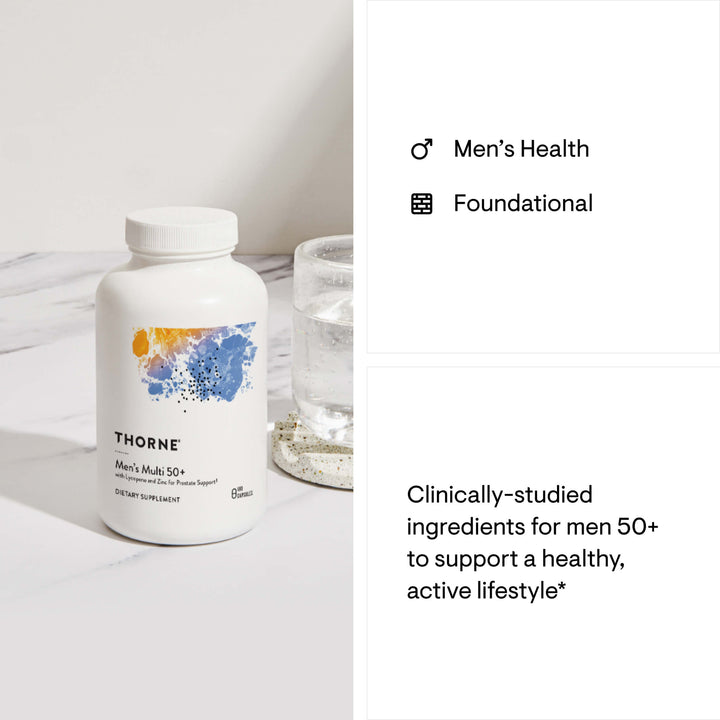Thorne Men’s Multi 50+ bottle beside glass of water on marble surface promoting men’s health