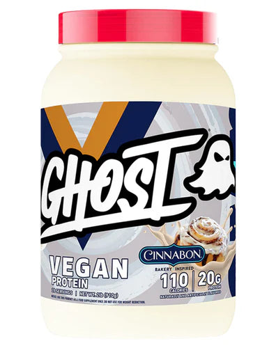 A container of Ghost Lifestyle Vegan Protein powder in a white jar with brand and product information, and a graphic of a ghost.