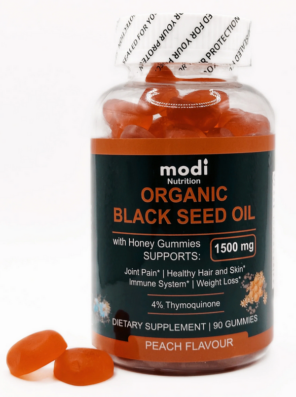 Bottle of Modi Nutrition Organic Black Seed Oil gummies with peach flavor on a white background