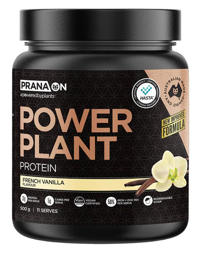 A container of Prana On Power Plant Protein powder in french vanilla flavor. The packaging is black with gold and white text and an image of a chocolate bar.